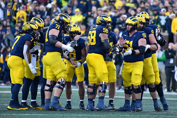 Donovan Edwards (7), Evan Link (71), Tyler Morris (8), Giovanni El-Hadi (58), Greg Crippen (51), and Josh Priebe (68)