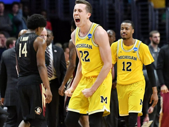 Duncan Robinson (22) and Muhammad-Ali Abdur-Rahkman (12)