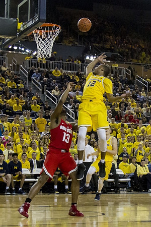 Muhammad-Ali Abdur-Rahkman (12) and Duncan Robinson (22)