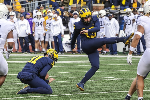 Brad Robbins (91) and Jake Moody (13)