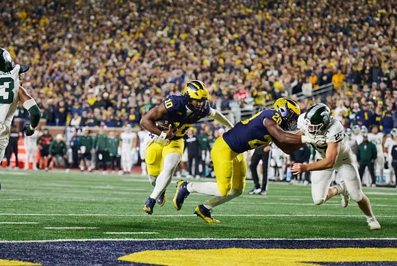 Alex Orji (10) and Kalel Mullings (20)