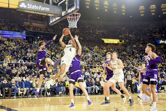 Nimari Burnett (4) and Will Tschetter (42)