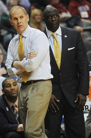 LaVall Jordan, Bacari Alexander, and John Beilein