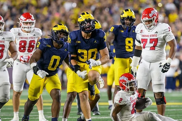 Josaiah Stewart (0), Jimmy Rolder (30), and Derrick Moore (8)