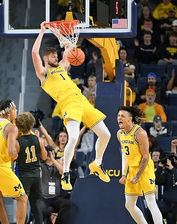 Hunter Dickinson (1), Jett Howard (13), and Terrance Williams II (5)