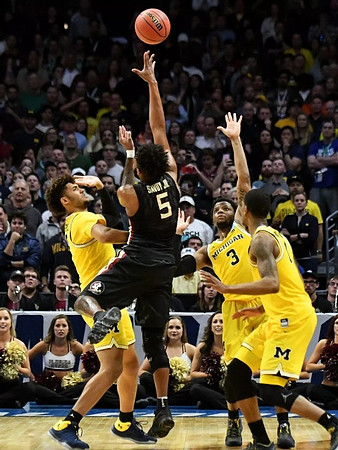 Isaiah Livers (4), Zavier Simpson (3), and Charles Matthews (1)