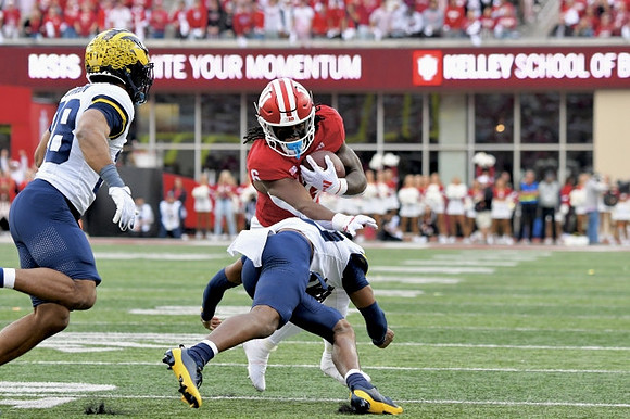 Quinten Johnson (28) and Jyaire Hill (20)