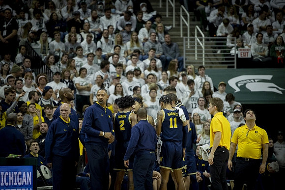 Juwan Howard and Michigan Team