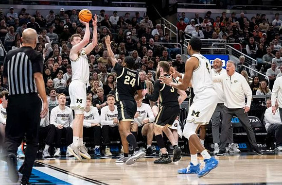 Danny Wolf (1), Purdue Head Coach Matt Painter, and Nimari Burnett (4)