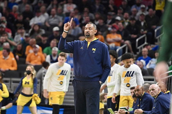 Juwan Howard and Michigan Team