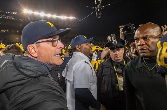 Jim Harbaugh, Ron Bellamy, and Michigan State Head Coach Mel Tucker