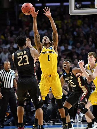 Charles Matthews (1) and Jon Teske (15)