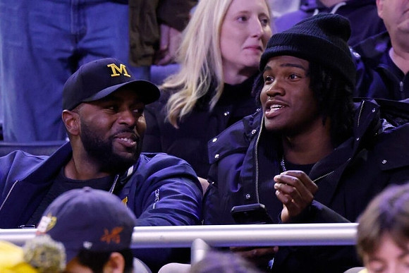 Sherrone Moore and Bryce Underwood