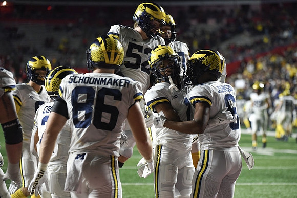 Blake Corum (2), Luke Schoonmaker (86), Karsen Barnhart (52), Andrel Anthony (1), and Cornelius Johnson (6)