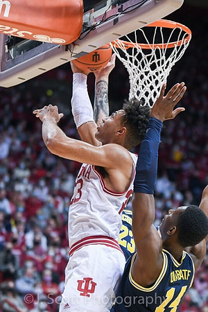 Moussa Diabate (14) and Brandon Johns Jr. (23)