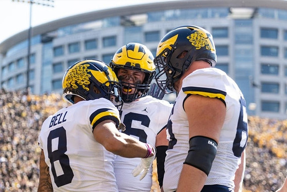 Ronnie Bell (8), Luke Schoonmaker (86), and Zak Zinter (65)