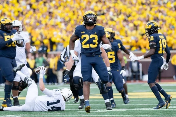 Mazi Smith (58), Michael Barrett (23), Junior Colson (25), and Rod Moore (19)