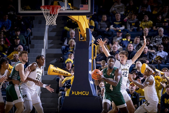 Isaiah Barnes (11), Tarris Reed Jr. (32), Will Tschetter (42), and Dug McDaniel (0)