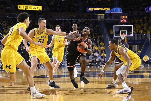 Justin Pippen (10), Will Tschetter (42), Danny Wolf (1), and Nimari Burnett (4)