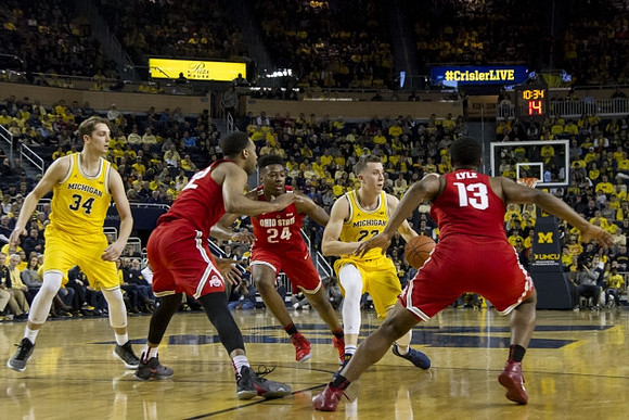 Mark Donnal (34) and Duncan Robinson (22)