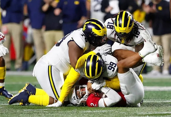 Kenneth Grant (78), Cam Goode (99), and Eyabi Anoma Okie (18)
