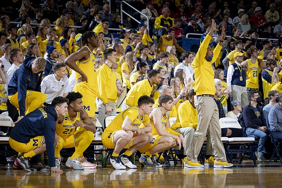 Saddi Washington and Michigan Team