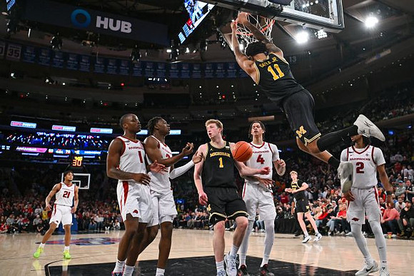 Danny Wolf (1), Roddy Gayle Jr. (11), and Sam Walters (24)