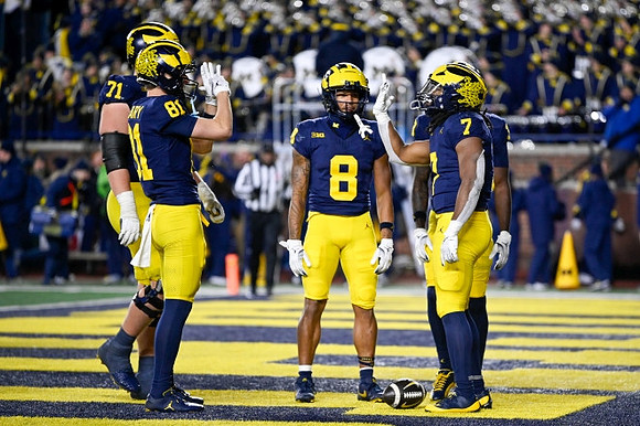 Evan Link (71), Peyton O'Leary (81), Tyler Morris (8), and Donovan Edwards (7)