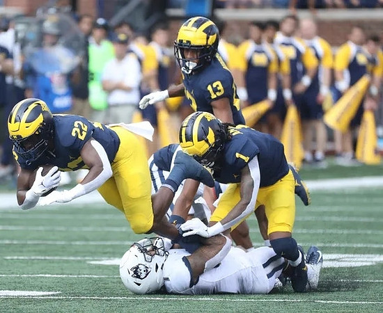 Tavierre Dunlap (22), Tyler Morris (13), and Andrel Anthony (1)