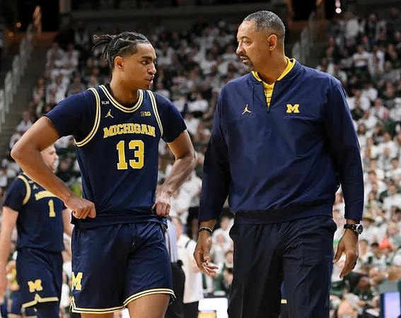 Jett Howard (13) and Juwan Howard