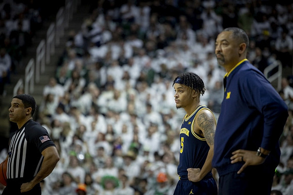 Terrance Williams II (5) and Juwan Howard