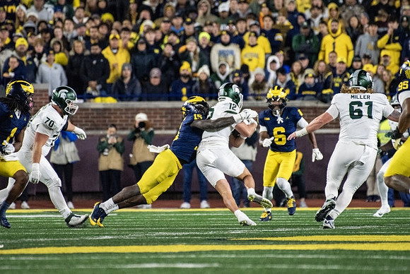 Ernest Hausmann (15), Brandyn Hillman (6), and Trey Pierce (95)