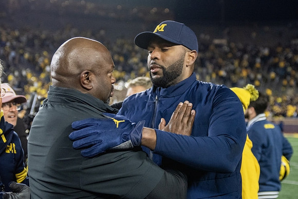 Tony Alford and Sherrone Moore