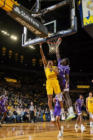 Nimari Burnett (4) and Vladislav Goldin (50)