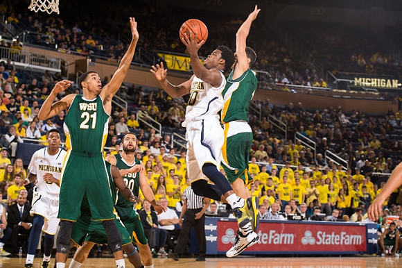 Kameron Chatman (3) and Derrick Walton Jr. (10)