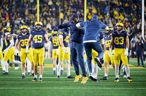 Sherrone Moore and Michigan Team