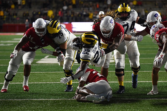 Andrew Gentry (75), Tavierre Dunlap (22), and Reece Atteberry (74)