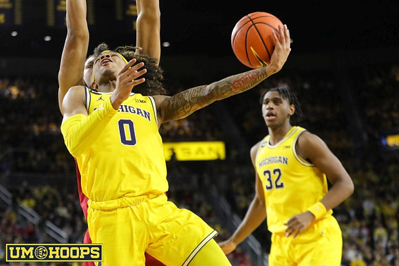 Dug McDaniel (0) and Tarris Reed Jr. (32)
