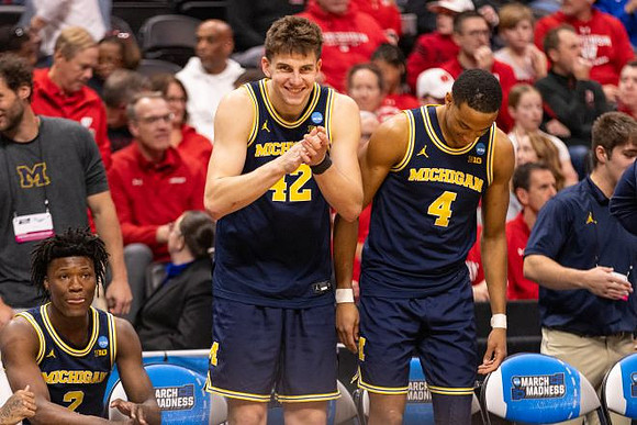 L.J. Cason (2), Will Tschetter (42), and Nimari Burnett (4)