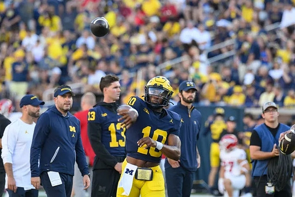 Kirk Campbell, Jack Tuttle (13), and Alex Orji (10)