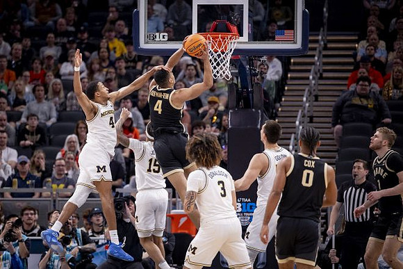 Nimari Burnett (4), Rubin Jones (15), Tre Donaldson (3), and Vladislav Goldin (50)