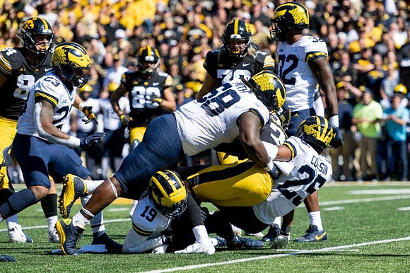 Michael Barrett (23), Rod Moore (19), Mazi Smith (58), Junior Colson (25), and Jaylen Harrell (32)