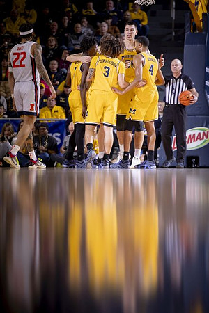 L.J. Cason (2), Tre Donaldson (3), Nimari Burnett (4), and Vladislav Goldin (50)