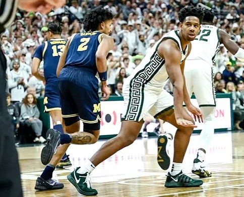 Jett Howard (13) and Kobe Bufkin (2)