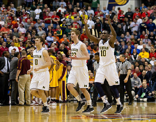 Zack Novak (0), Evan Smotrycz (23), and Tim Hardaway Jr. (10)