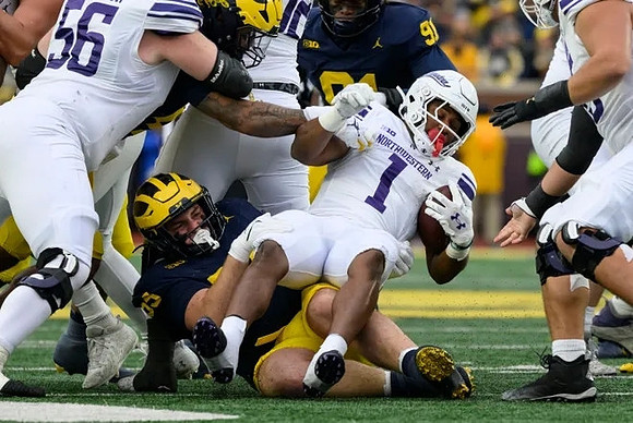 Mason Graham (55) and Cameron Brandt (91)