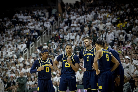 Dug McDaniel (0), Jett Howard (13), Hunter Dickinson (1), Juwan Howard, and Terrance Williams II (5)