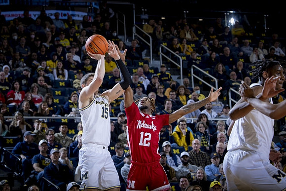 Joey Baker (15) and Tarris Reed Jr. (32)