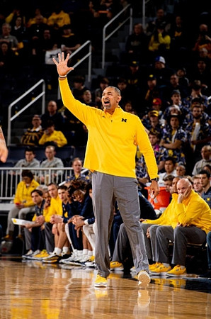 Juwan Howard and Phil Martelli