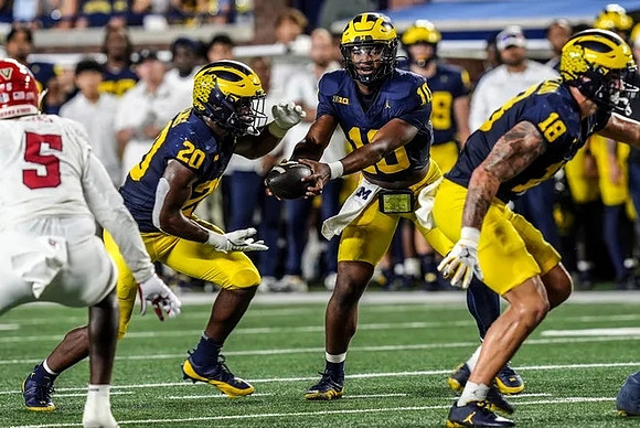 Kalel Mullings (20), Alex Orji (10), and Colston Loveland (18)